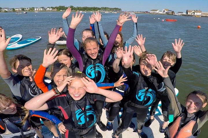 a group of people in a body of water